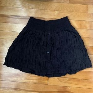 Black ruched mini skirt